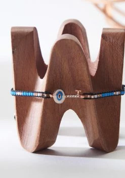 EVIL EYE KEY BRACELET WITH MULTI COLORED BEADS ON SILK ROPE